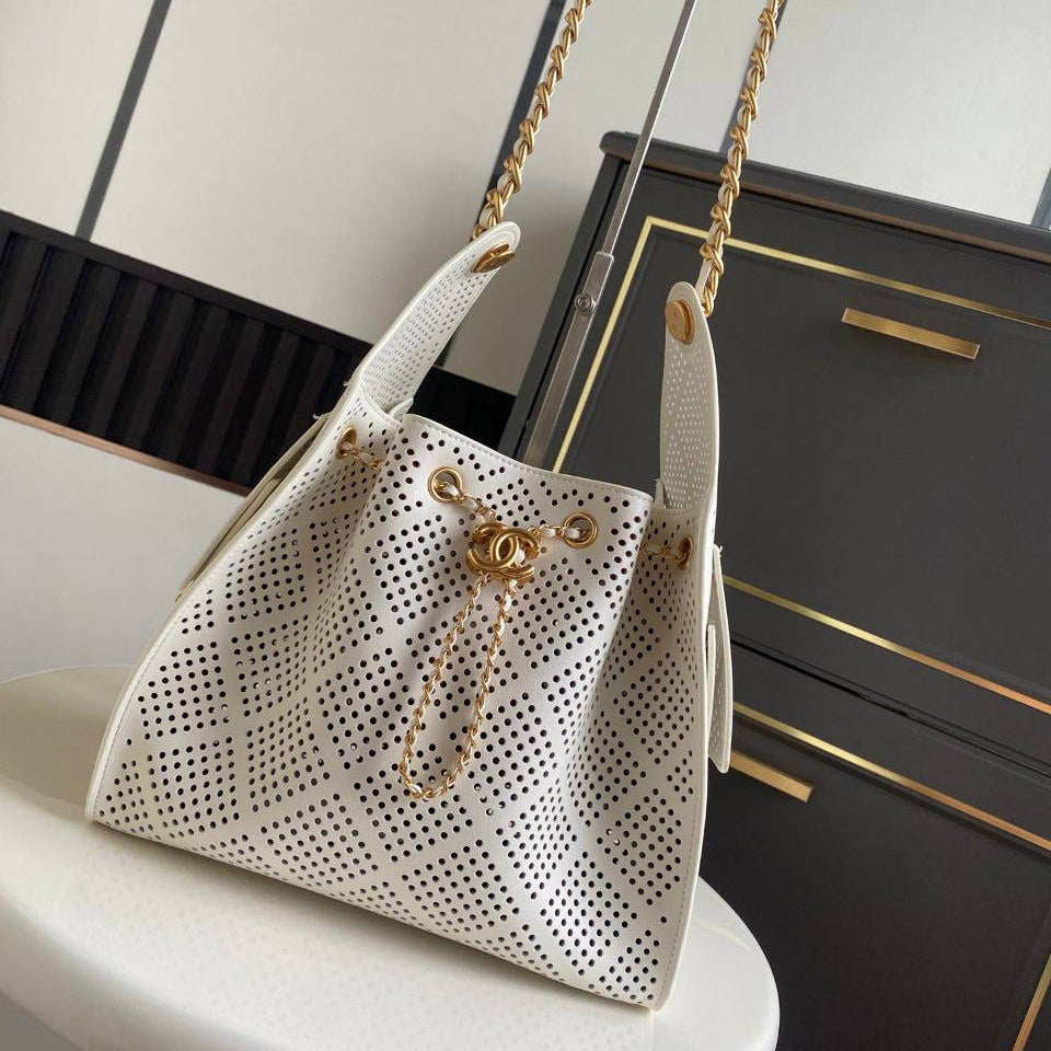 Chanel Perforated Leather Bucket Bag with Gold Chain