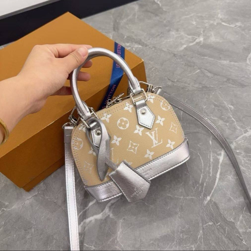 Louis Vuitton Alma Large Beige and Silver Monogram Bag