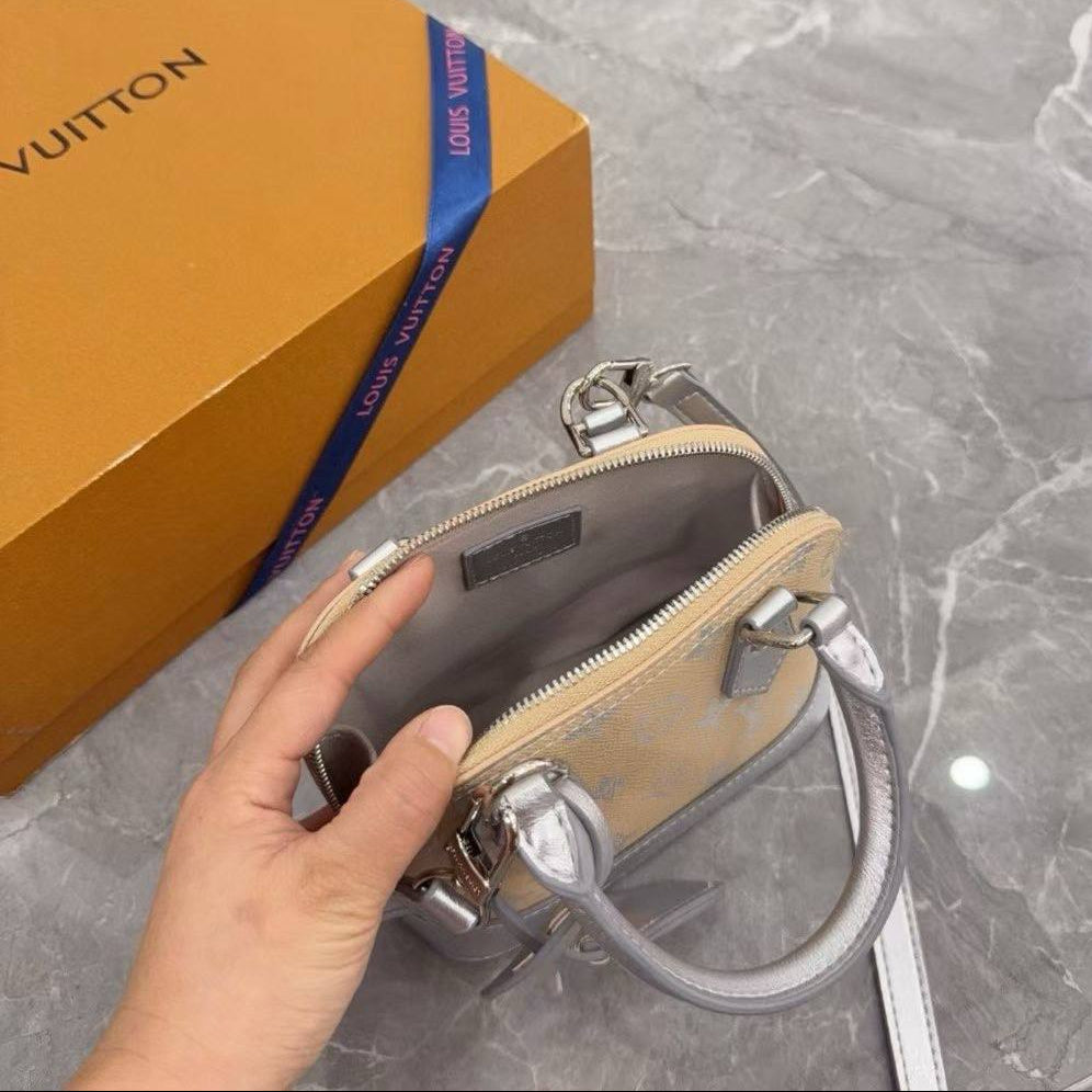 Louis Vuitton Alma Large Beige and Silver Monogram Bag