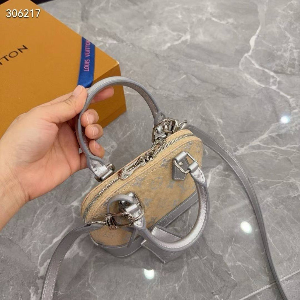 Louis Vuitton Alma Large Beige and Silver Monogram Bag