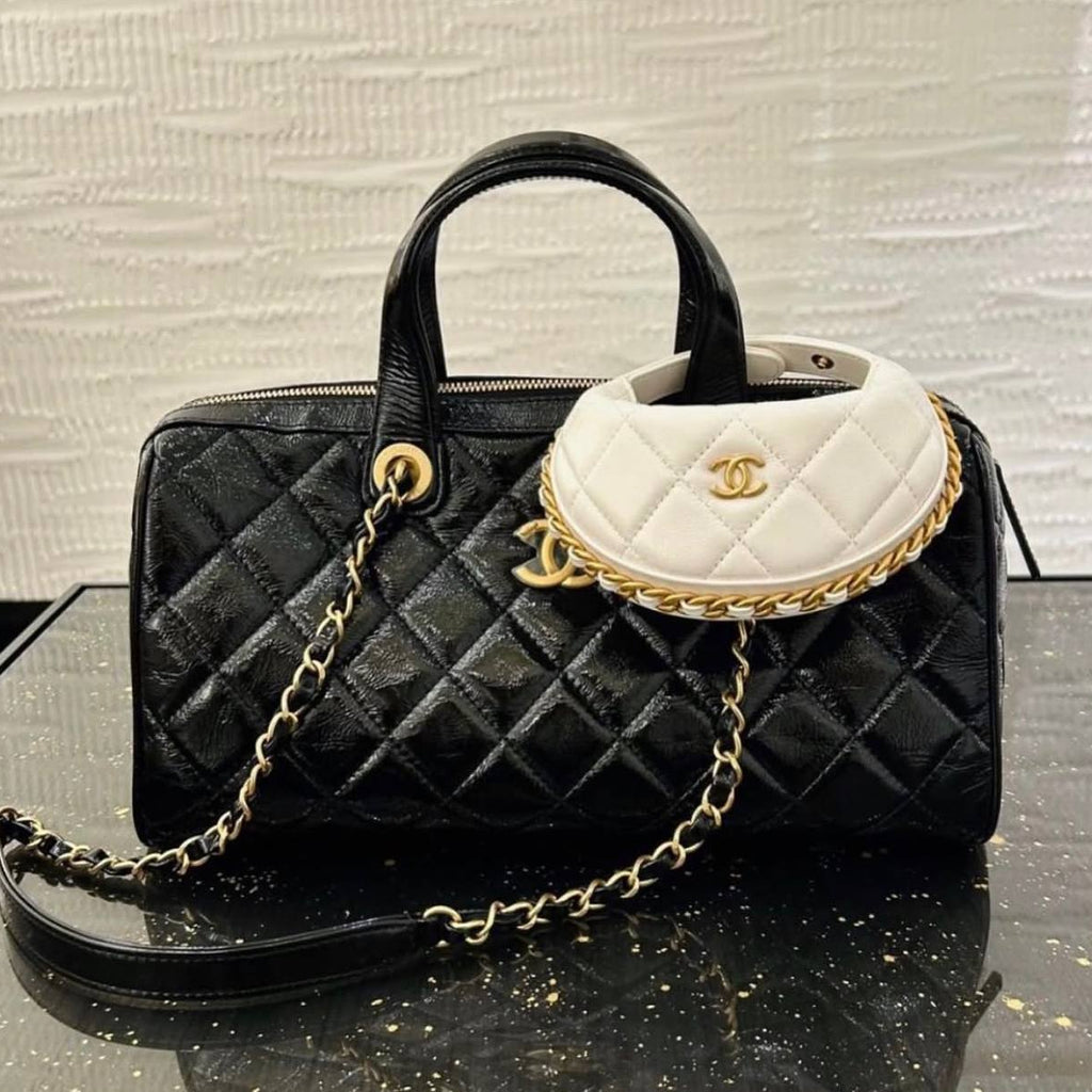 Chanel Brown Quilted Leather Handbag with Gold-Tone Chain