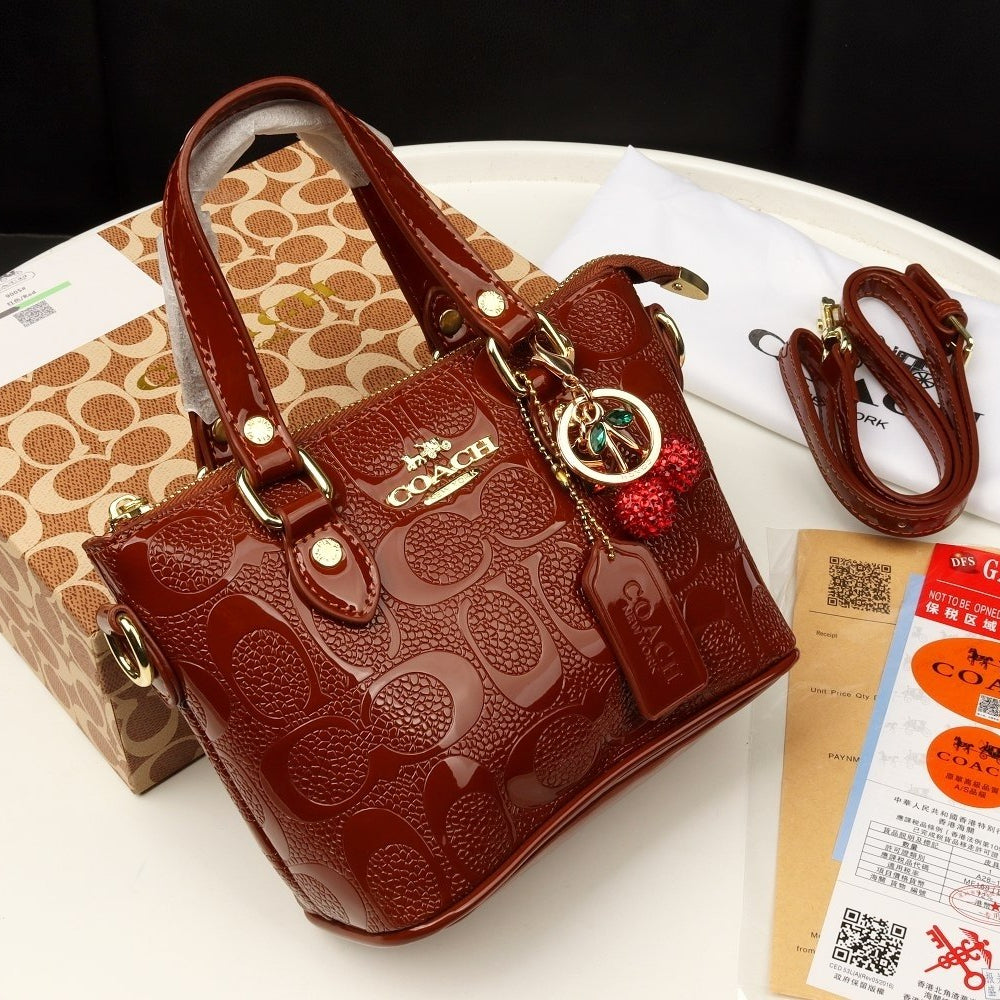 COACH Glossy Red Satchel with Detachable Cherry Charm 🍒✨👜