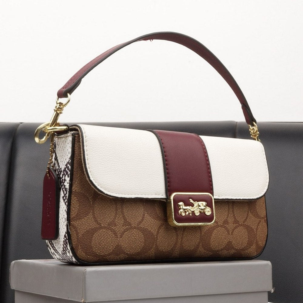 Coach Signature Canvas & Pebble Leather Crossbody with Snakeskin Detail 👜✨🐍