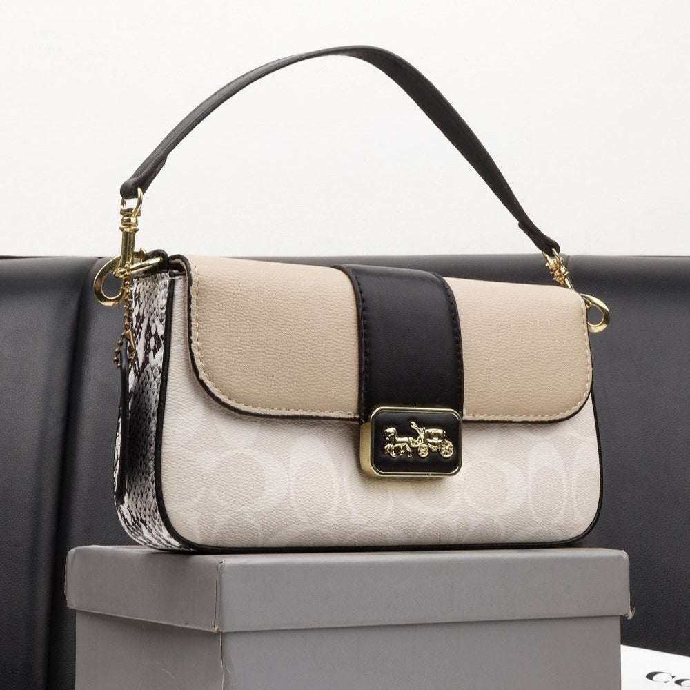 Coach Signature Canvas & Pebble Leather Crossbody with Snakeskin Detail 👜✨🐍