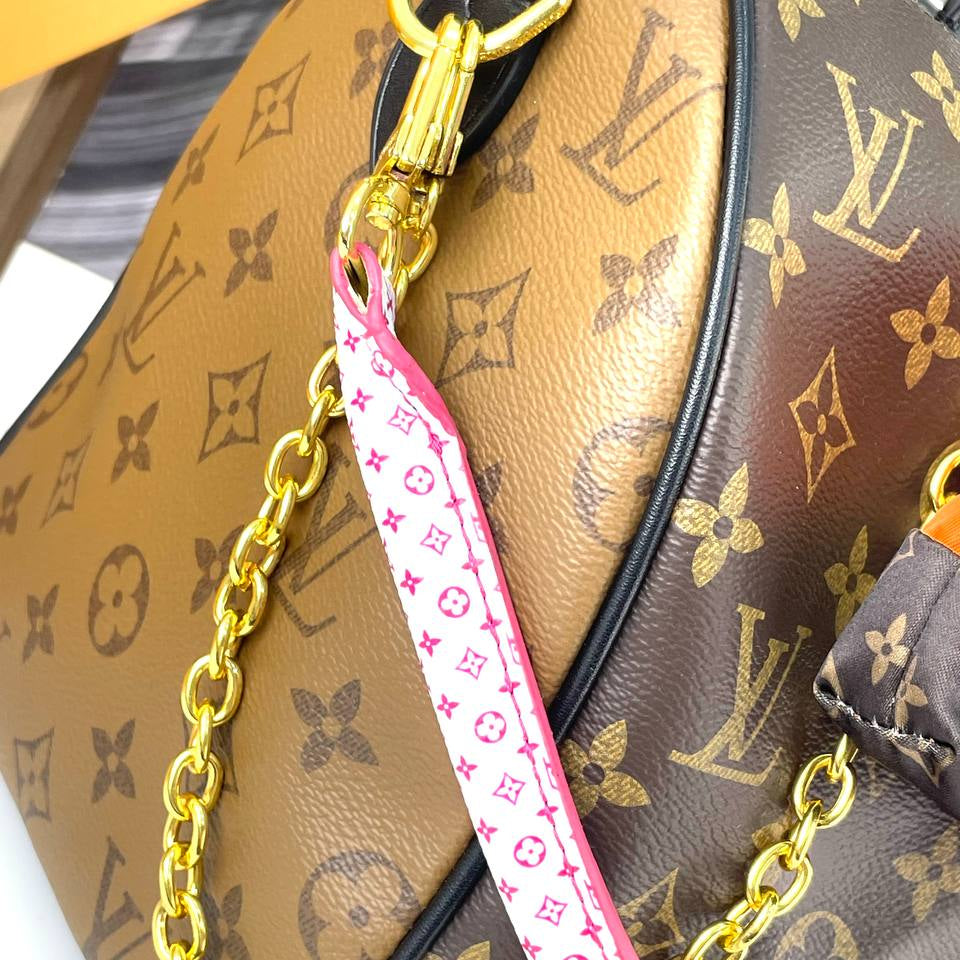 Louis Vuitton Monogram Canvas Bag with Burgundy Leather Accents