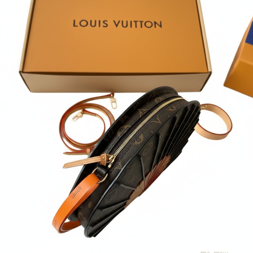 Louis Vuitton Fan Shaped Monogram Leather Handbag 👜✨🤎