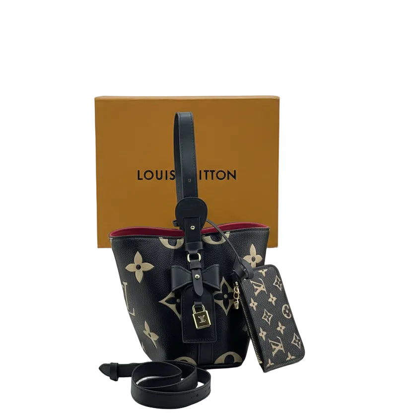 Louis Vuitton Monogram Empreinte Bucket Bag with Bow Detail 👜✨🎀