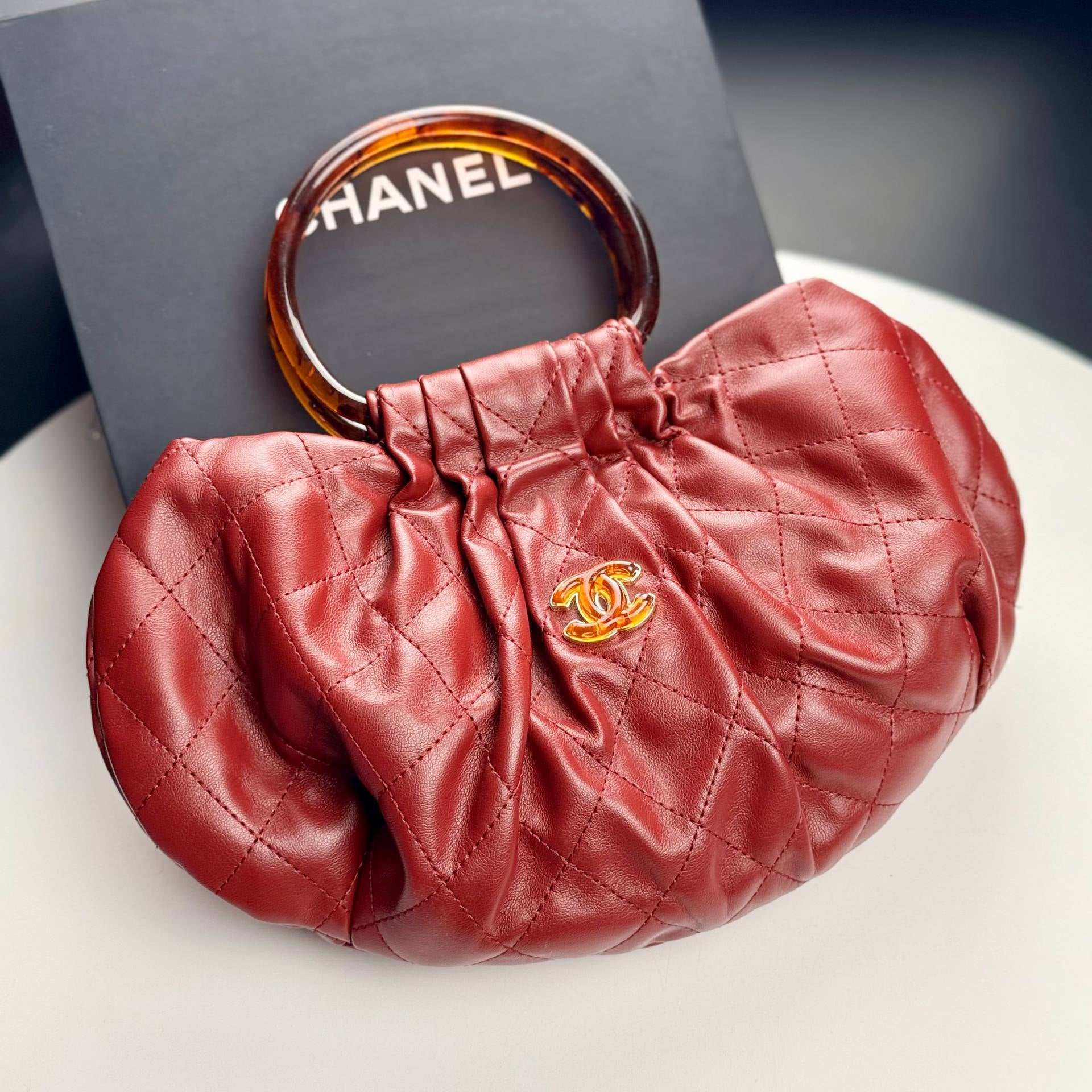Chanel Quilted Leather Pouch with Tortoise Resin Handle 👜✨💎