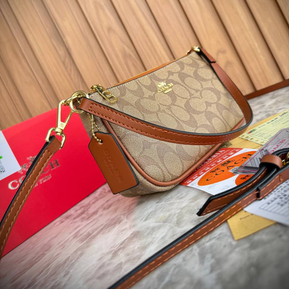 Coach Signature Canvas Small Wristlet Crossbody in Neutral Tones 👜✨🏙️