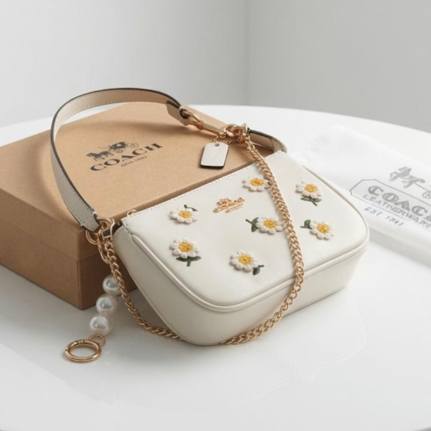 COACH Signature Print and Floral Crossbody Bag with Pearl Charm 👜🌸✨