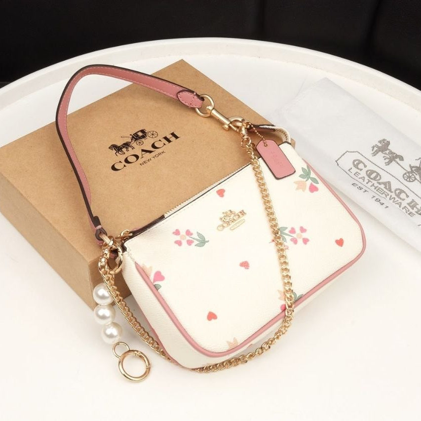 COACH Signature Print and Floral Crossbody Bag with Pearl Charm 👜🌸✨