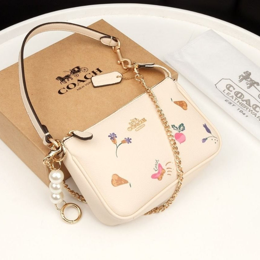 COACH Signature Print and Floral Crossbody Bag with Pearl Charm 👜🌸✨